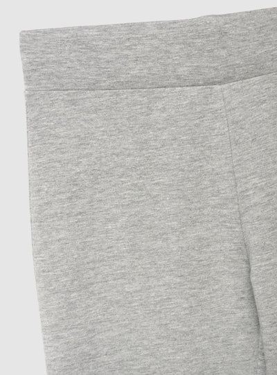 Leggings lunghi a zampa tinta unita
