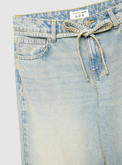 Jeans wide leg con cintura annodata