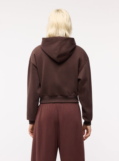Felpa crop con zip e cappuccio
