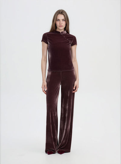 T-shirt con lupetto e bottoni diagonali