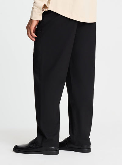 Pantaloni chino wide leg con pinces