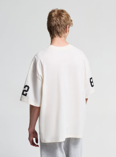 T-shirt con stampa numero e vestibilità boxy