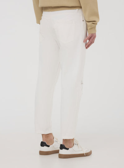 Loose fit jeans with rips