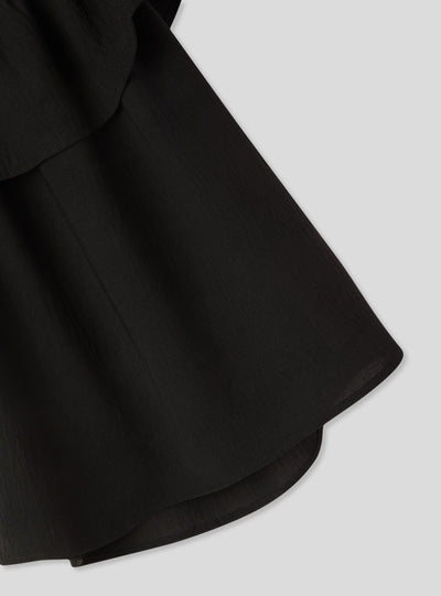 Blusa spalle scoperte con balza