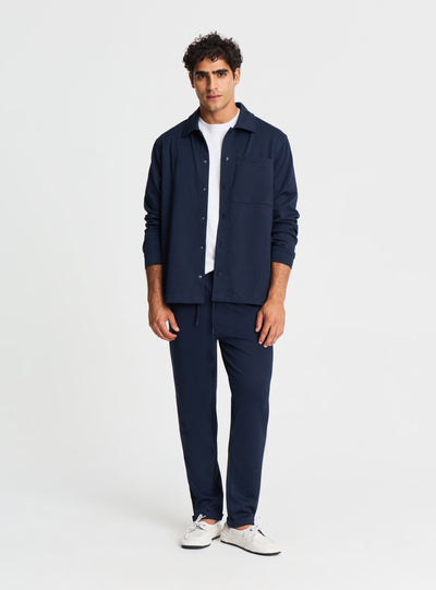 Pantaloni tuta lunghi in piquet con risvolto