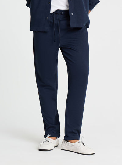 Pantaloni tuta lunghi in piquet con risvolto