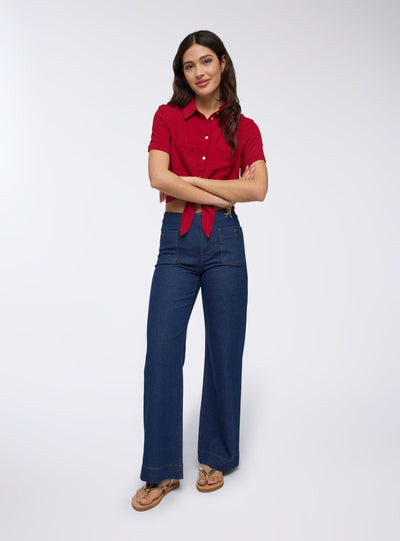 Jeans scuri wide leg con tasche applicate