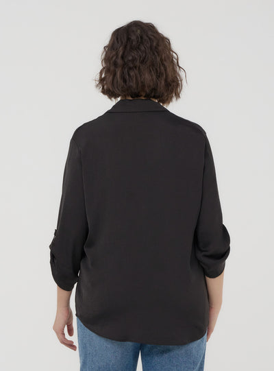 Plain-coloured blouse with V-neckline