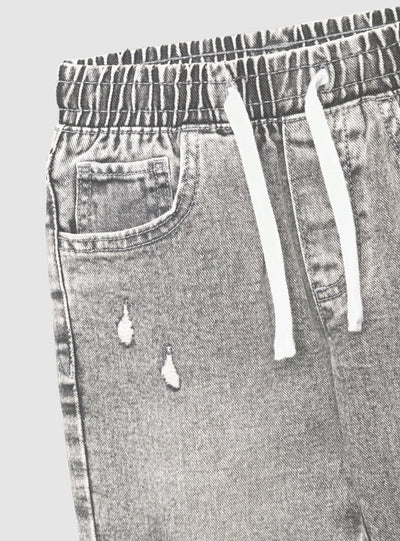 Children's jogger jeans with rips and drawstring