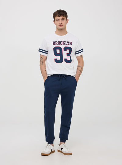 Pantaloni tuta leggeri in cotone con coulisse e tasche
