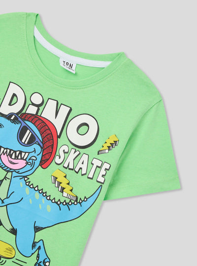 T-shirt stampa dinosauro e skateboard