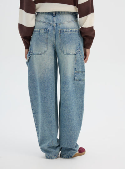 Jeans carpenter con cintura regolabile