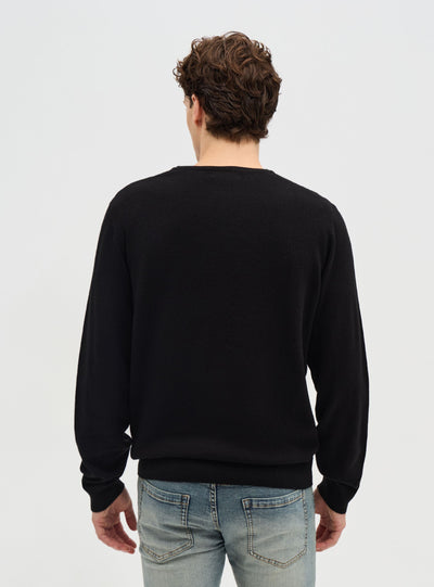 Maglia scollo a V a tinta unita