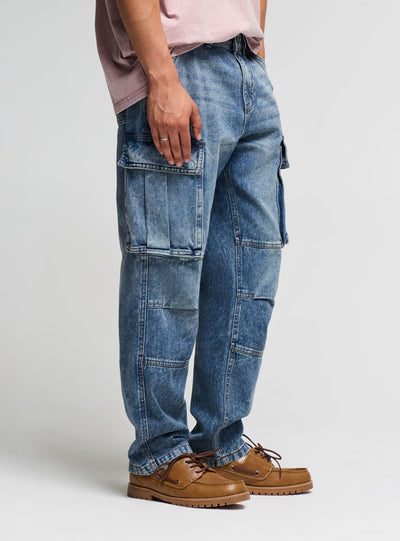 Jeans cargo over a tinta unita