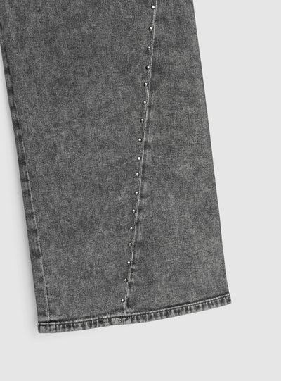 Jeans wide leg con borchie