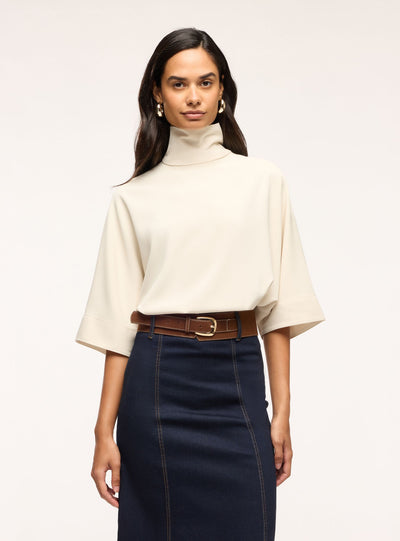 Blusa con collo alto e maniche 3/4