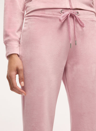 Pantaloni tuta a zampa ciniglia tinta unita