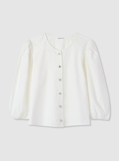 Blusa con bottoni gioiello e maniche a sbuffo