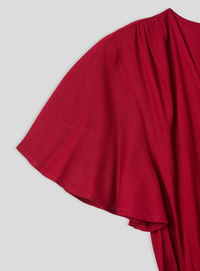 Vestito lungo con scollatura a incrocio e fusciacca