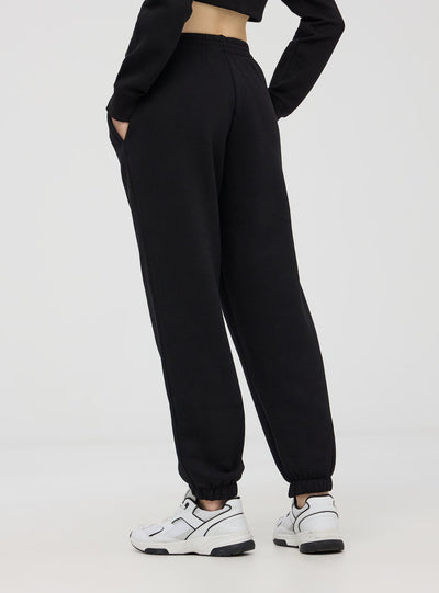 Pantaloni della tuta a vita alta con polsini