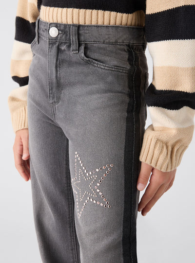 Jeans wide leg con stelle di borchie