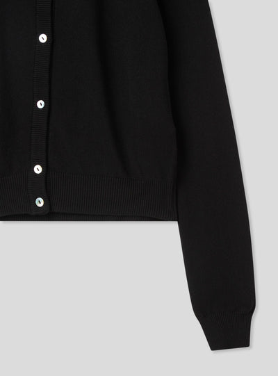 Cardigan tinta unita con bottoni