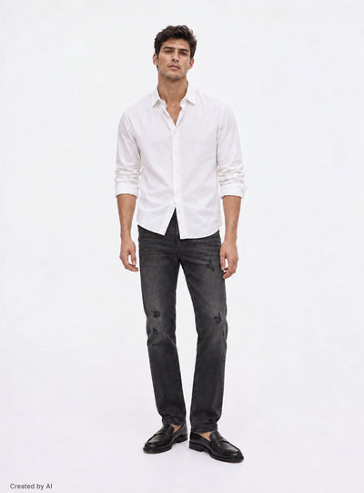 Jeans skinny con strappi piccoli
