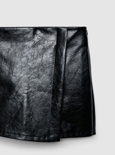 Skort mini asimmetrica similpelle