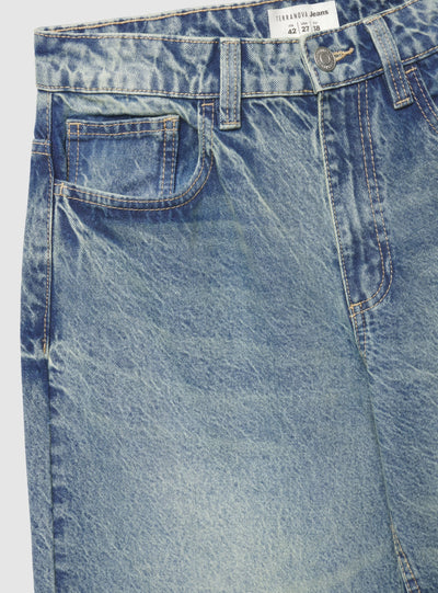 Jeans barrel con fibbia posteriore