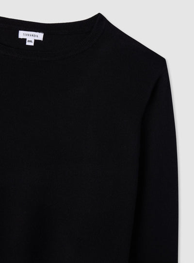 Plain-colour jumper with buttons at the cuffs