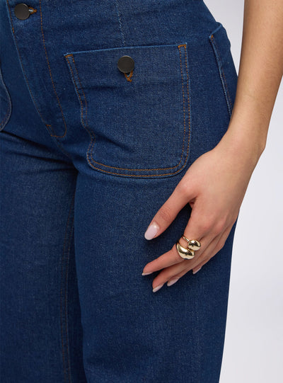 Jeans scuri wide leg con tasche applicate