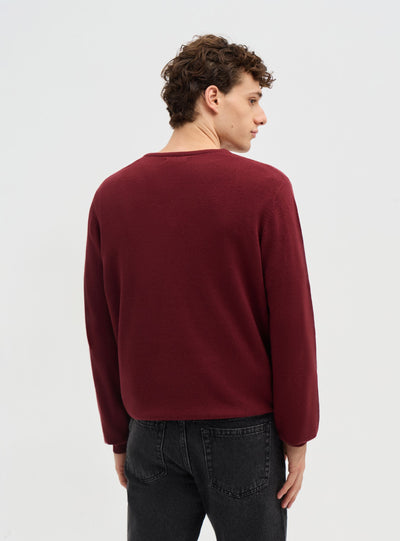 Maglia scollo a V a tinta unita