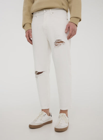 Loose fit jeans with rips