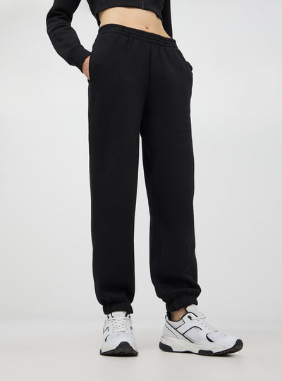 Pantaloni della tuta a vita alta con polsini