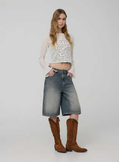 Denim jorts with distressing