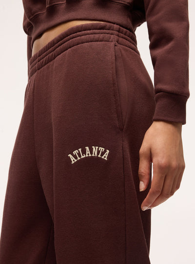 Pantaloni tuta vita alta con scritta college