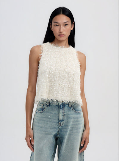 Top con paillettes e effetto piumette