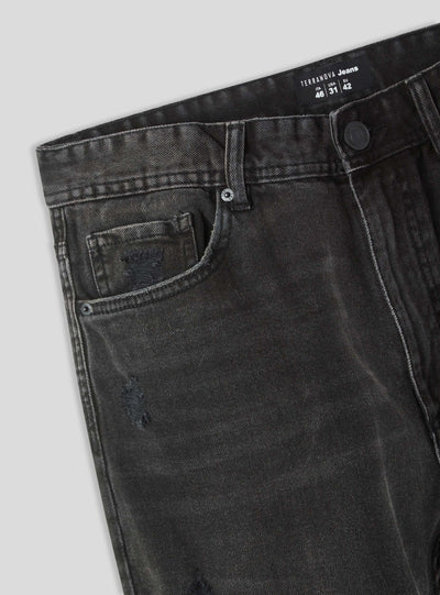 Jeans relaxed con strappi ampi