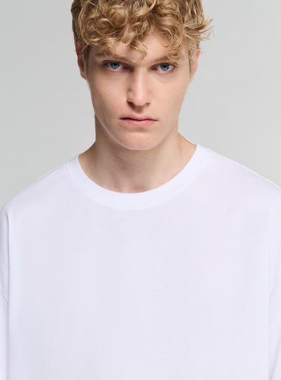 T-shirt over a tinta unita