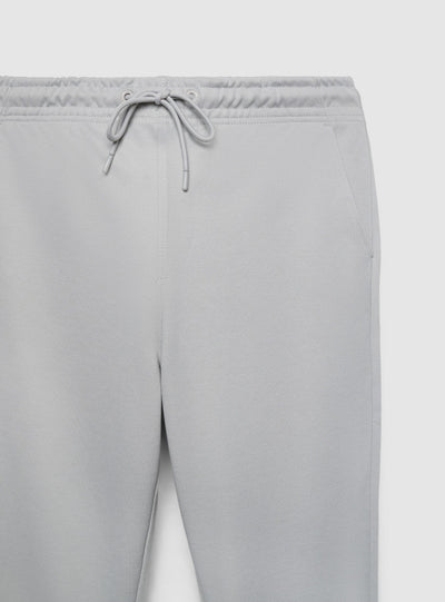 Pantaloni tuta lunghi in piquet con risvolto