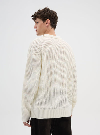 Maglia polo con zip e punto mosso