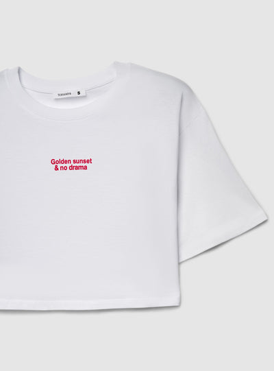 T-shirt crop ampia con scritta