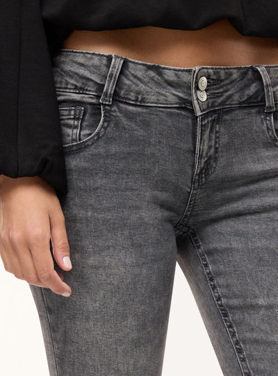 Jeans zampa a vita ultra bassa
