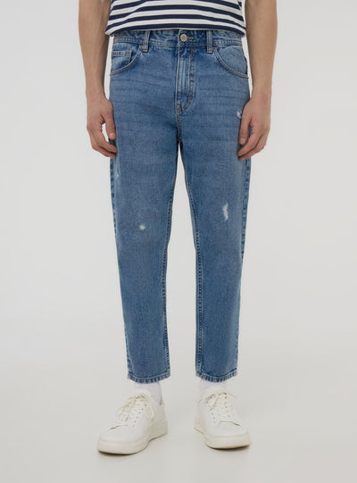 Loose fit jeans with small rips