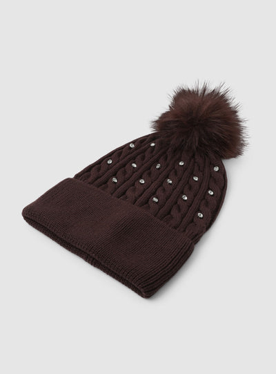 Berretto a trecce con pompon e strass