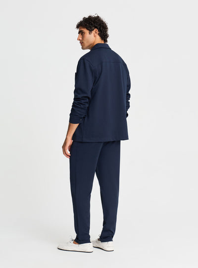 Pantaloni tuta lunghi in piquet con risvolto