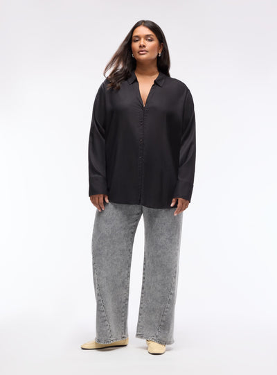 Jeans wide leg con borchie
