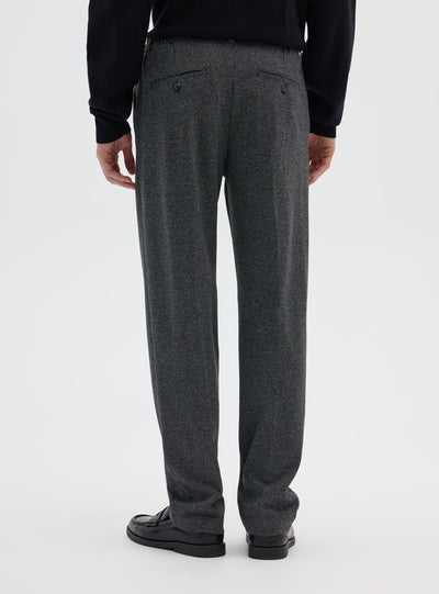 Pantaloni chino con pieghe a pied de poule