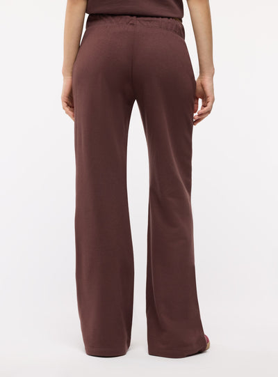 Pantaloni tuta ampi a zampa con coulisse