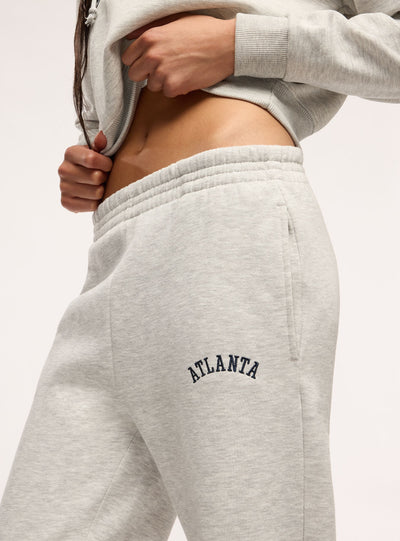 Pantaloni tuta vita alta con scritta college